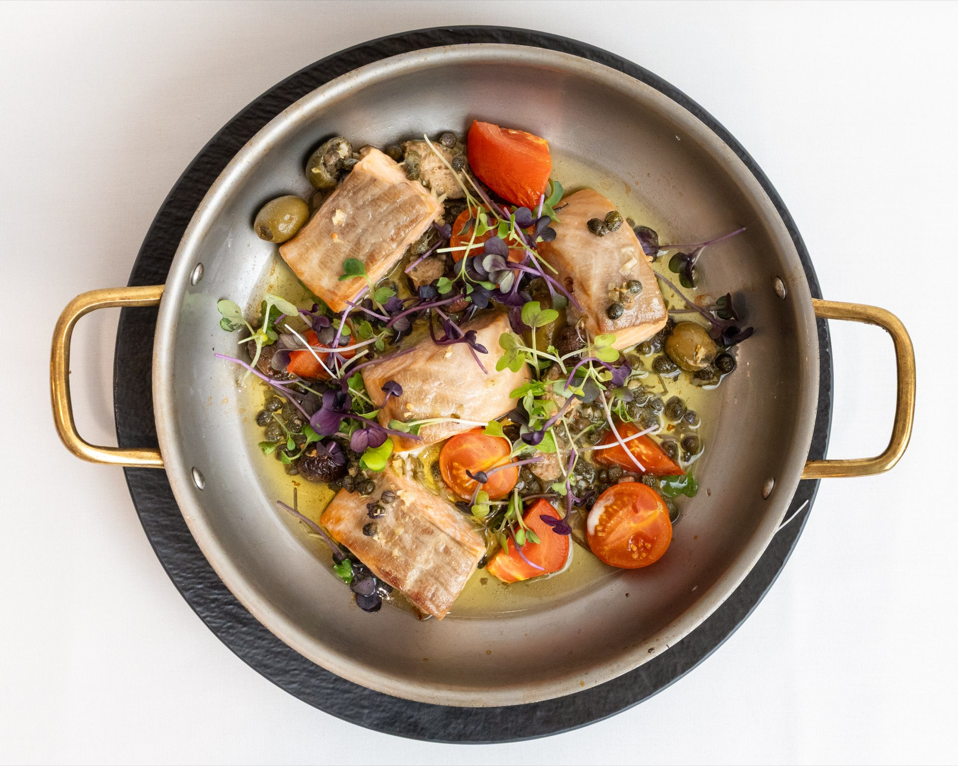 Seasonal vegetables with herbs and premium olive oil
